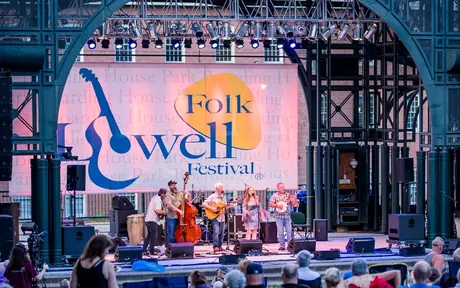 A band performing on the Lowell Folk Festival main stage