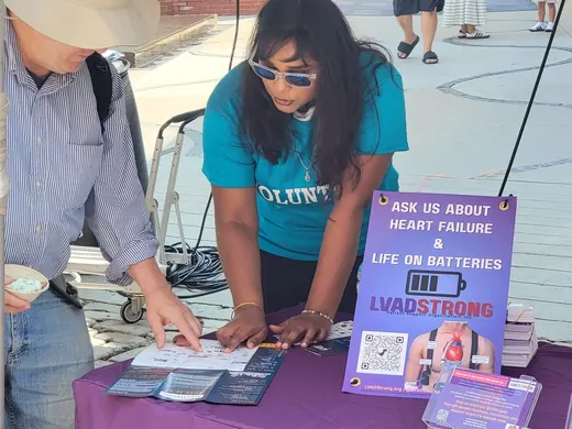 LVADStrong volunteer at a community table